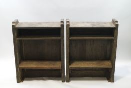 A pair of oak Church bookcases, each with two shelves,
