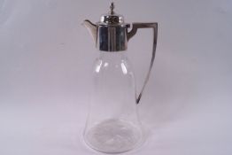 A silver mounted claret jug, the domed cover with acorn finial, inscribed "S. & W.