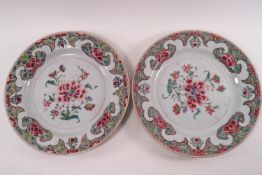 A pair of Chinese famille rose plates, painted with peonys, Qian Long, 22.