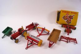 A collection of Dinky die-cast farm vehicles and equipment, comprising: 323 Triple Gang Mower,