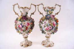 A pair of 19th century English porcelain two handled vases,