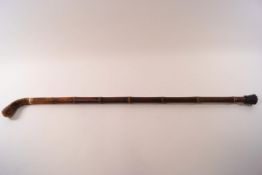 An early 20th century bamboo shafted sword stick