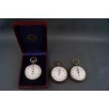 Three pocket stopwatches, incuding a boxed example by Marcks & Co,