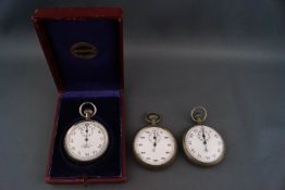 Three pocket stopwatches, incuding a boxed example by Marcks & Co,