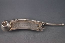 A George Unite silver boatswain's whistle, with engraved decoration, 9.
