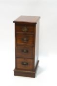 An Edwardian mahogany small four drawer chest,