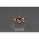 A Cloggau Welsh 9ct bi-colour gold ring,