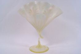 A Whitefriars vaseline glass dish of scallop shape by James Powell,