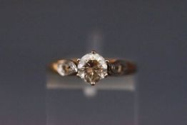 A yellow metal dress ring set with cubic zirconia. hallmarked 9ct gold, sheffield. Size: M 1.