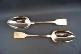 A pair of Victorian silver fiddle pattern tablespoons both engraved with the monogram "H J",