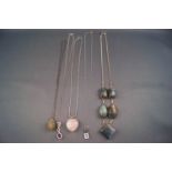A selection of five silver necklaces to include a five stone labradorite centrepiece necklace,