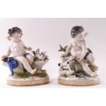 A pair of 19th century Continental porcelain figures of Putti,