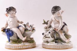 A pair of 19th century Continental porcelain figures of Putti,