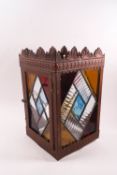An early 20th century copper and stained glass hall lantern,