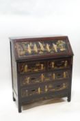 A Chinese bureau, the fall front over four drawers,