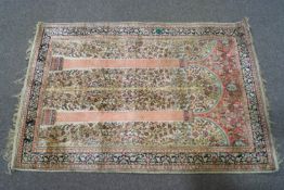 A 20th century Chinese silk rug,