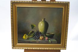 Cynthia Montefiore, Still life with fruit on a ledge, oil on canvas, signed lower right, 50.