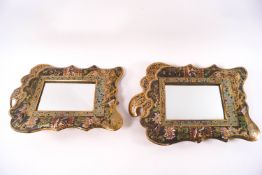 A near pair of Victorian Aesthetic brass and champleve enamel strut mirrors,