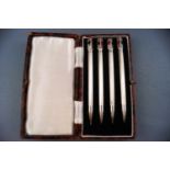 A set of four enamelled bridge pencils, stamped "Sterling Silver Made In England",