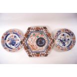 A pair of late 18th century Chinese export porcelain plates painted with an Imari palette,