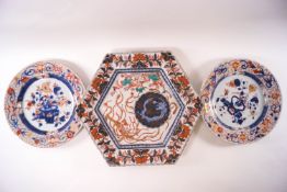A pair of late 18th century Chinese export porcelain plates painted with an Imari palette,