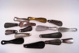 Fourteen Victorian and Edwardian advertising shoe horns
