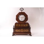 A Regency mahogany and brass inlaid mantel clock,