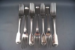 Seven silver fiddle pattern dessert forks, various dates and makers,