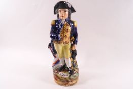 A 19th century Staffordshire pottery jug in the form of Admiral Lord Nelson,