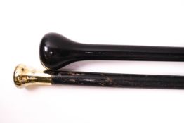 Two black evening walking canes,