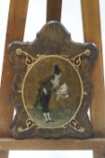 A Victorian leather framed triple mirror with paintings of a Gentleman and Lady to the reverse of