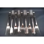 Nine silver fiddle pattern forks, various dates and makers,