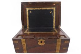 A Victorian rosewood and brass bound writing slope,