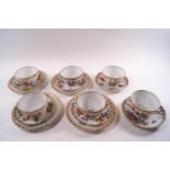 A Dresden porcelain tea service, comprising six cups and saucers and four small plates,