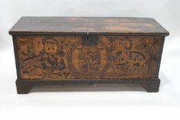 A 19th century oak pokerwork coffer with iron carrying handles,