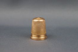 A rare Charles Horner 15ct gold thimble, Chester 1931, 5.