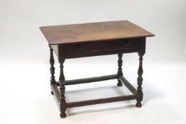 A George IV oak side table with drawer and on turned legs,