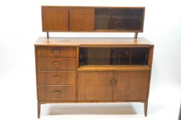A mid-20th century oak side display cabinet,
