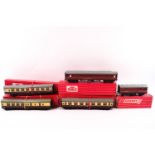 Four Hornby-Dublo coaches and a Hornby Pasenger Brake Van,