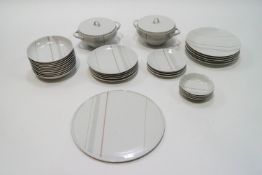 A 1950's/60's German porcelain dinner and tea service, ten place setting,