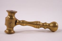 A small brass auctioneer's gavel, 12.