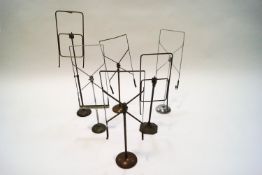 Six vintage metal adjustable stands,