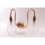 A pair of Christopher Wray copper wall lights with frosted glass shades