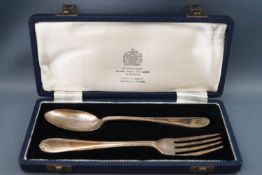 A cased silver fork and spoon christening set, Sheffield 1956 and 1957,