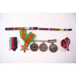 Three WWII medals: Defence, George VI and 1939-45 Star, named to 25324 G H GATEHOUSE,