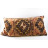 A Turkish carpet cushion,