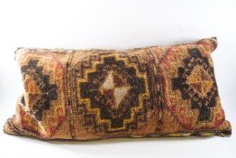 A Turkish carpet cushion,