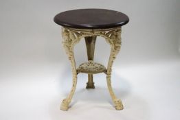 A Victorian painted cast iron pub table with later wooden top,