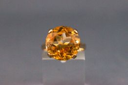 A 9ct gold and citrine single stone ring,