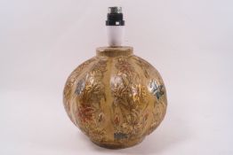 A Kashmir paper mache table lamp with gilt and painted iris decoration,